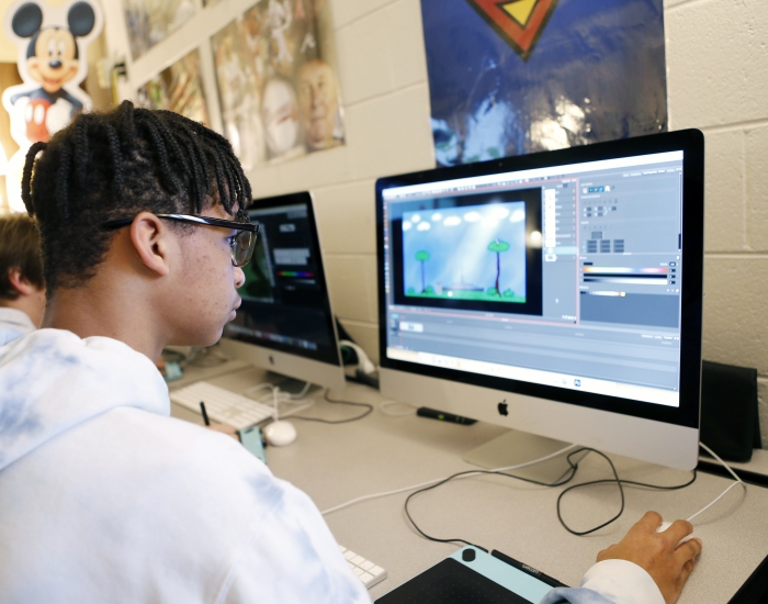 A student practices computer programming.